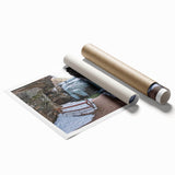 Vibrant landscape print depicting stunning canyons in warm earth tones, rolled and packaged in a protective tube, perfect for home decor or art enthusiasts.