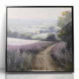 Framed acrylic wall art depicting a serene countryside landscape, featuring lush green fields and a bright blue sky, elegantly displayed with a sleek black frame.