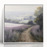 Framed landscape wall art depicting a serene countryside scene with lush greenery and a clear blue sky, showcasing a modern white frame for elegant decor.