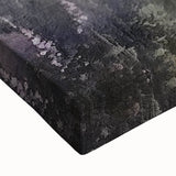 Close-up of a vibrant stretched canvas wall art depicting a serene countryside landscape with lush greenery and rolling hills, perfect for home decor.