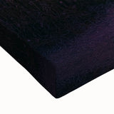 Close-up of a stretched canvas showcasing a serene countryside landscape with vibrant green fields and a clear blue sky, ideal for home decor.