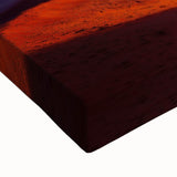 Close-up of a stretched canvas artwork depicting a vibrant desert landscape, showcasing warm tones of orange and yellow, with detailed textures that enhance the natural scenery. Perfect for home decor.