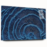 Large abstract floral print in vibrant blues and greens on acrylic glass, ideal for bedroom or dining room art.