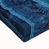 Large art print of a black and white landscape featuring detailed floral elements on stretched canvas.