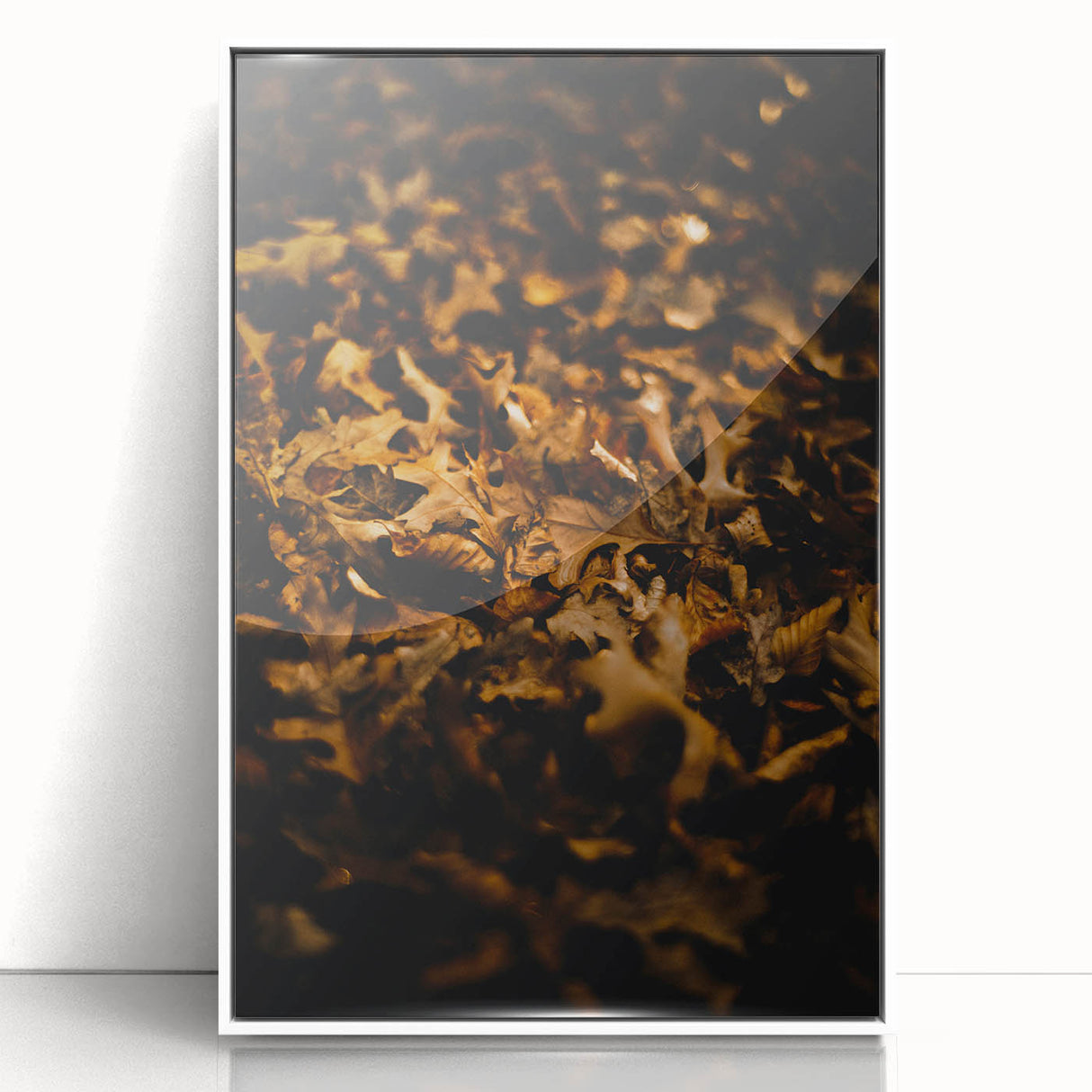 Art deco poster featuring an autumnal scene with muted orange and brown tones on white framed acrylic.