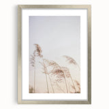 Textured abstract art print in muted orange and beige hues on a framed canvas, ideal for bedroom wall decor.