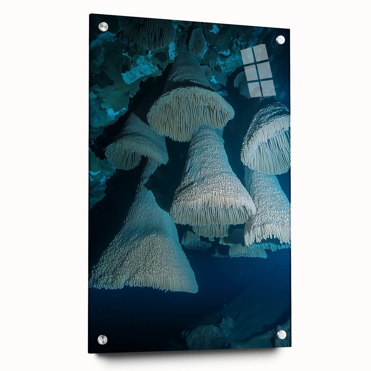 Acrylic glass landscape artwork depicting a cave scene, showcasing intricate details and vibrant colors, displayed from a side view with decorative pins.