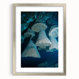 Framed landscape artwork depicting a serene cave scene, featuring a silver mat for enhanced elegance. Ideal for modern home decor with nature themes.