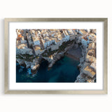 Framed landscape artwork showcasing majestic cliffs with a silver mat, perfect for home decor, emphasizing natural beauty and elegance. Ideal for art enthusiasts.