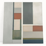 Abstract geometric canvas art featuring bold colors and intricate patterns, leaning against a neutral wall, ideal for modern home decor. Perfect for adding a vibrant touch to any living space.