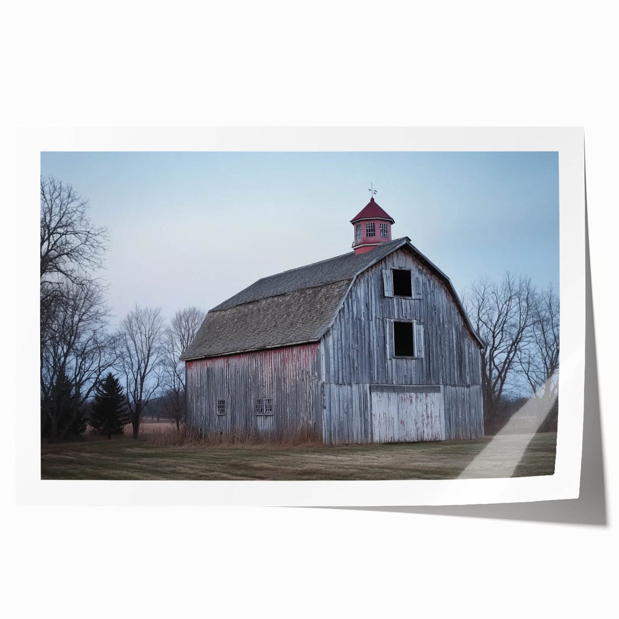 Rolled landscape barn art print showcasing a rustic farmhouse scene with vibrant colors, expertly wrapped in a protective tube for safe delivery.