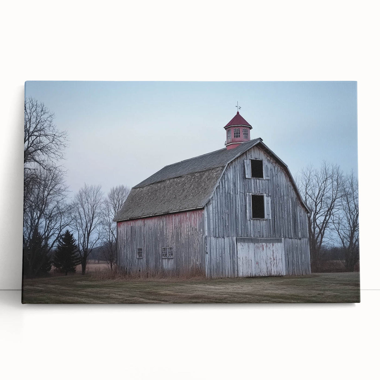 Stretched canvas artwork depicting a serene landscape with a rustic barn, showcasing warm earth tones and detailed textures, perfect for home decor.