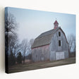 Stretched canvas artwork depicting a landscape scene of a rustic barn, showcasing vibrant colors and intricate details, ideal for enhancing home decor or office space.