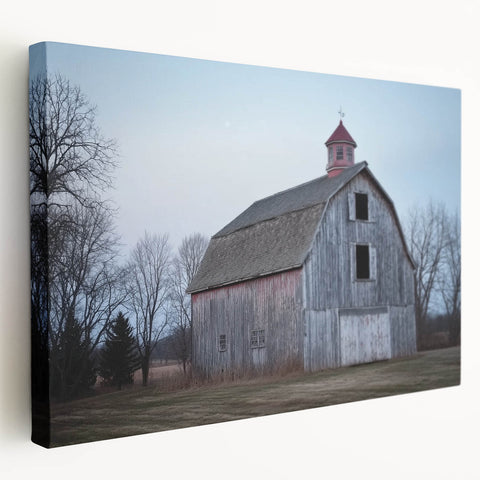 Stretched canvas artwork depicting a landscape scene of a rustic barn, showcasing vibrant colors and intricate details, ideal for enhancing home decor or office space.