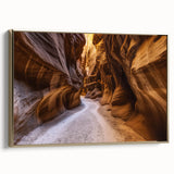Framed canvas artwork showcasing a stunning landscape of canyons, highlighted by rich gold accents, perfect for enhancing modern home decor with natural beauty.