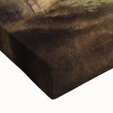 Close-up view of a stretched canvas landscape wall art depicting a serene countryside scene, featuring vibrant greens and soft blue skies, perfect for home decor.