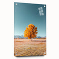 Acrylic glass artwork showcasing a vibrant landscape with rolling fields, displayed at an angle and secured with decorative pins, ideal for modern decor.