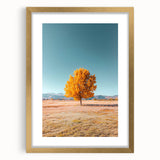 Elegant gold-framed landscape artwork showcasing vibrant fields under a clear blue sky, featuring a classic mat for added dimension and style. Perfect for home decor.
