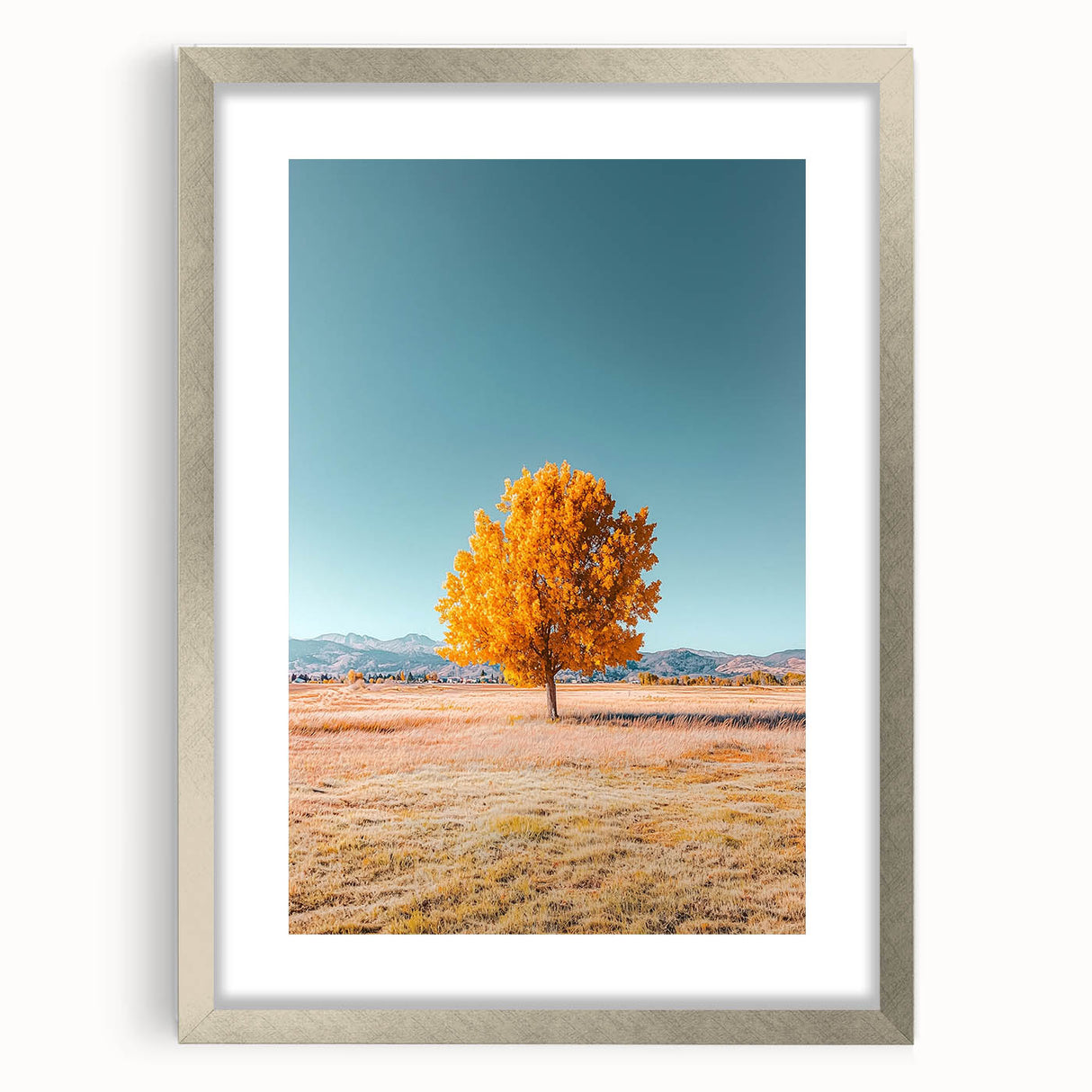 Framed landscape artwork featuring vibrant fields under a bright sky, with a sleek silver mat and frame, perfect for enhancing home decor or office spaces.
