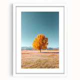Framed landscape artwork depicting vibrant green fields under a clear blue sky, encased in a clean white mat and sleek frame, perfect for home decor.