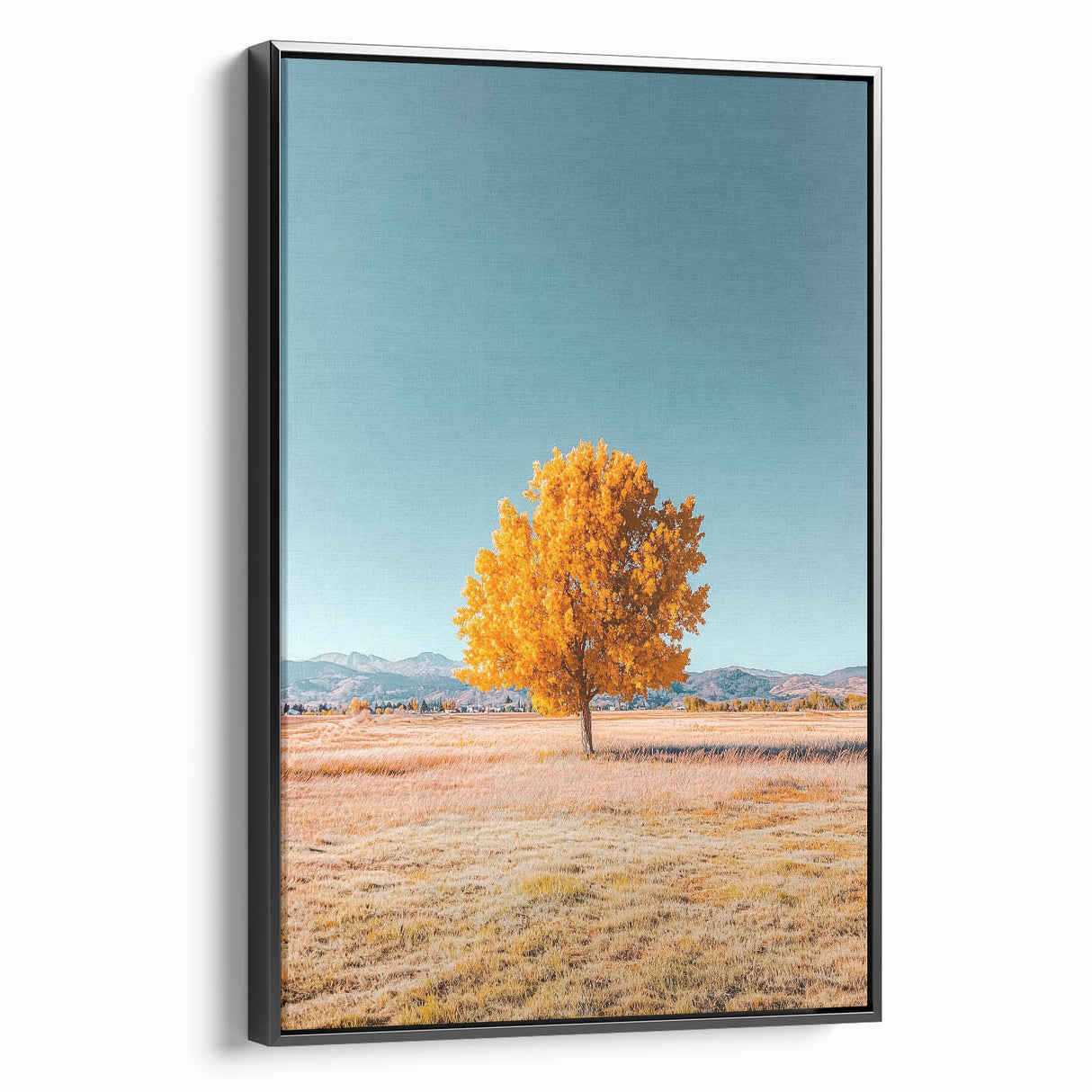 Framed canvas artwork showcasing a serene landscape of rolling fields in vibrant greens and yellows, featuring a sleek black frame for modern decor enhancement. Perfect for adding a tranquil touch to living spaces.