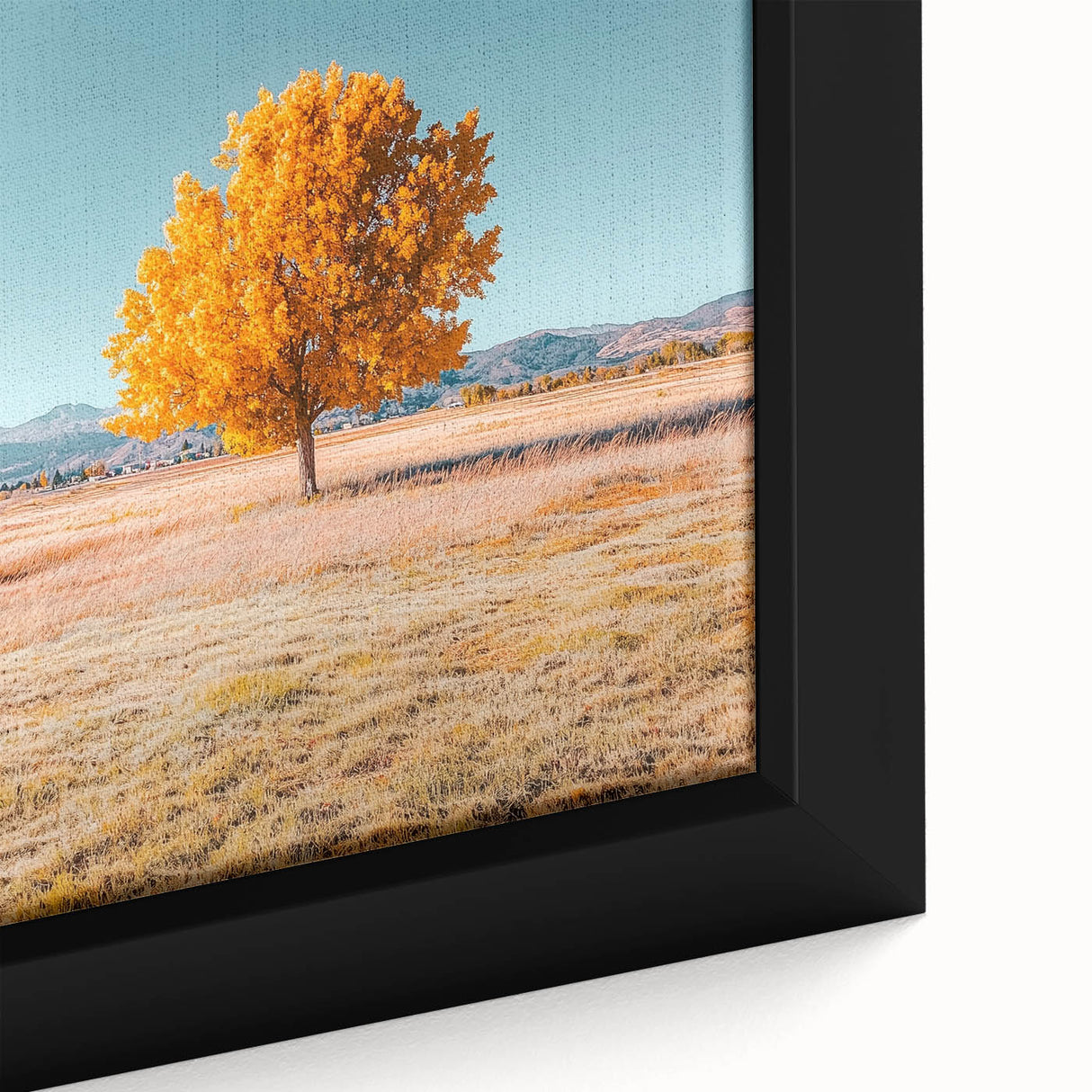 Close-up of a framed canvas artwork depicting vibrant landscapes and fields, showcasing rich colors and intricate details, ideal for modern home decor.