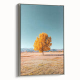 Framed canvas artwork showcasing a serene landscape of fields, featuring vibrant green hues and a silver frame, ideal for enhancing home decor and artistic ambiance.