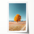 Vibrant landscape print showcasing rolling green fields under a bright blue sky, expertly rolled and packaged in a protective cardboard tube, ideal for home decor.