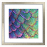 Close-up of an abstract, textured art print depicting an animal, encased in a silver frame with mat.