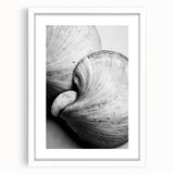 Abstract art print featuring close-up nature elements in a white frame, using a palette of green and brown.