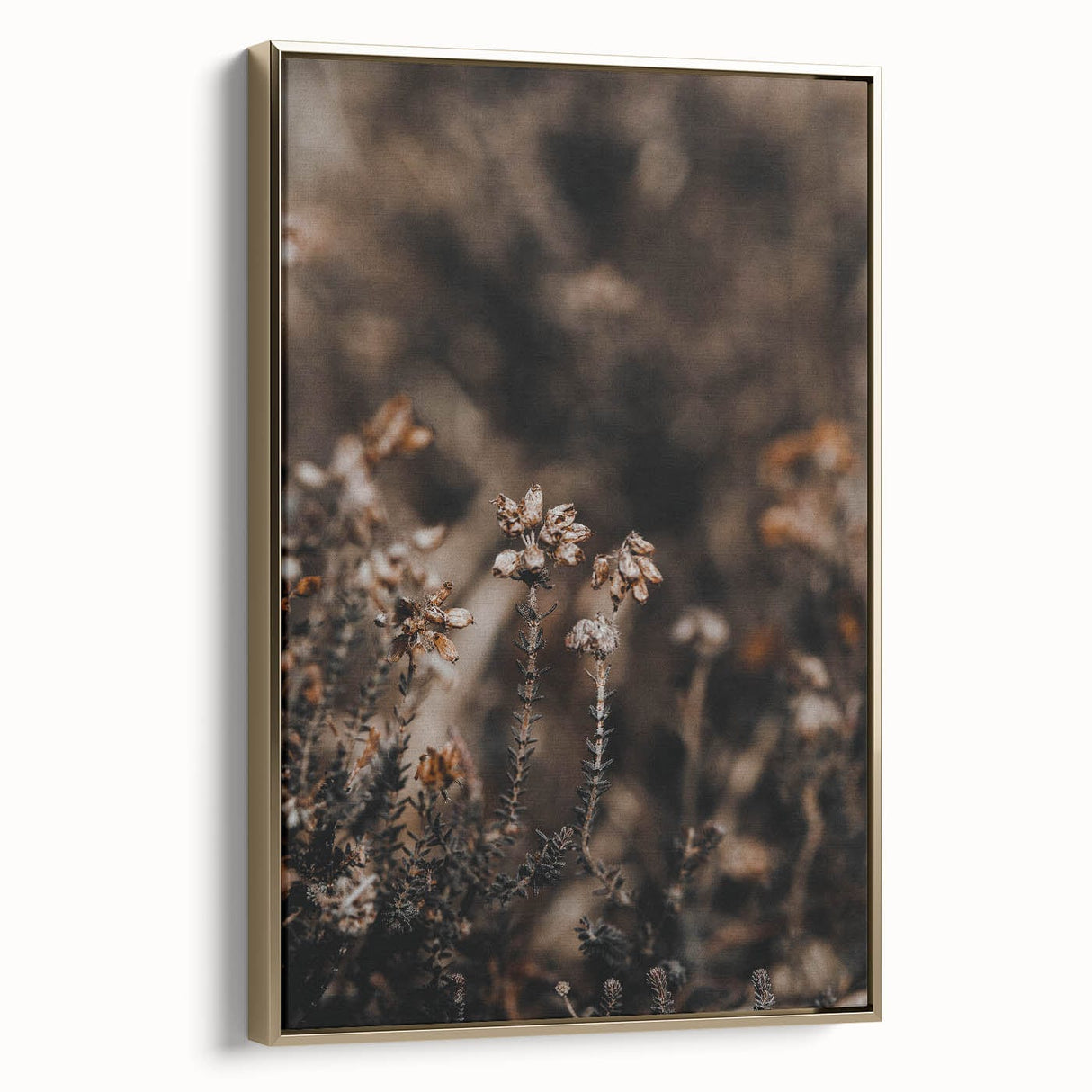 Framed canvas featuring a vintage-style landscape painting with autumnal trees and muted gold and black tones.