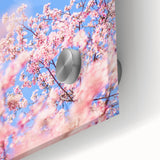 Large abstract wall art depicting spring themes in pastel shades on acrylic glass, suitable for dining room decor.