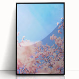 Large abstract wall art featuring swirling blue and green tones on a black acrylic framed print.