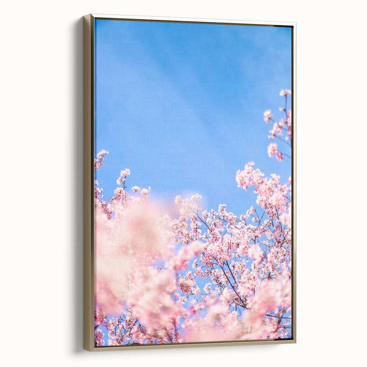 Framed canvas wall art depicting a vintage-style landscape with spring theme in gold and black tones.