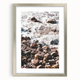 Textured abstract art print in silver frame, featuring swirling blues and greens, ideal for bedroom wall decor.