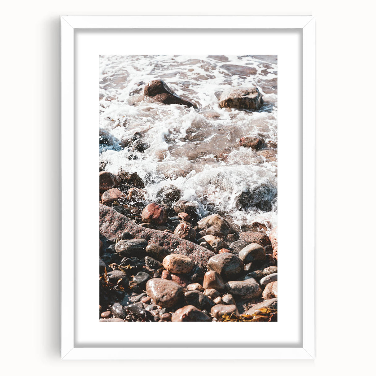 Abstract art print featuring swirling blue and green patterns on a white framed canvas.