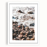 Abstract art print featuring swirling blue and green patterns on a white framed canvas.