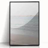 Large abstract wall art featuring swirling blue and green patterns on a framed acrylic print.