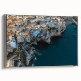 Framed canvas artwork depicting a stunning cliff landscape with vibrant colors and intricate details, featuring a sleek silver frame that enhances its elegance.