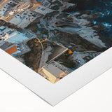 Vibrant rolled canvas print showcasing a dramatic landscape of towering cliffs under a bright blue sky, ideal for home decor and art collectors.