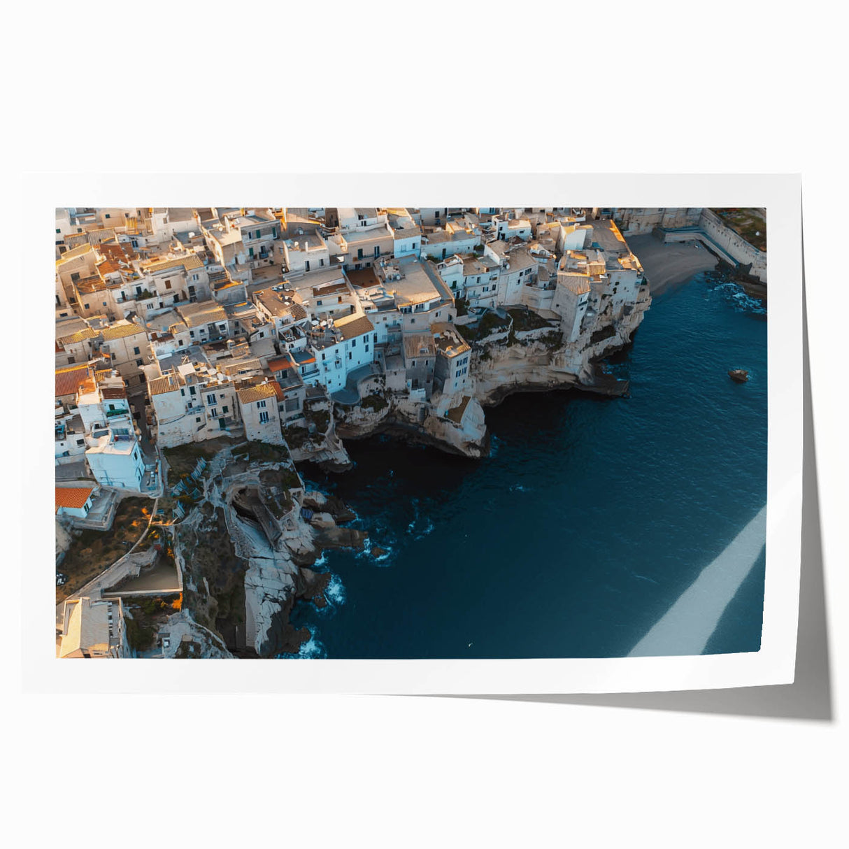 Stunning landscape art print showcasing dramatic cliffs against a vibrant sunset sky, rolled and ready for framing, ideal for home decor or office ambiance.