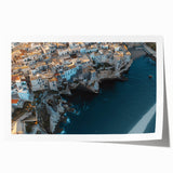 Stunning landscape art print showcasing dramatic cliffs against a vibrant sunset sky, rolled and ready for framing, ideal for home decor or office ambiance.