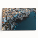 Stretched canvas artwork depicting a vibrant landscape with dramatic cliffs and a serene blue sky, ideal for modern home decor and art enthusiasts.