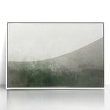 Framed abstract landscape wall art featuring vibrant colors of blue, green, and gold, set against a sleek white background, perfect for modern home decor.
