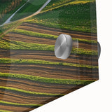 Close-up of a landscape acrylic glass artwork depicting a rustic barn scene, showcasing vibrant colors and intricate details that highlight the countryside beauty.