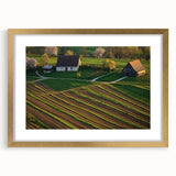 Elegant gold-framed landscape artwork featuring a barn scene, showcasing warm tones and intricate detailing, perfect for enhancing home décor.