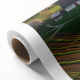 Rolled canvas showcasing a vibrant landscape barn design, featuring rich colors and intricate details, securely packaged in a durable cardboard tube for safe transport and display.