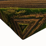 Close-up of a stretched canvas depicting a vibrant landscape scene featuring a rustic barn surrounded by lush greenery, showcasing detailed textures and colors, ideal for home decor.