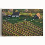 A vibrant landscape barn canvas print showcasing a rustic red barn surrounded by lush green fields, perfect for enhancing home decor with a country aesthetic.