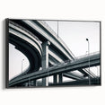 Framed canvas artwork showcasing a serene landscape bridge scene in black and white, with a contemporary design that enhances modern home decor aesthetics.